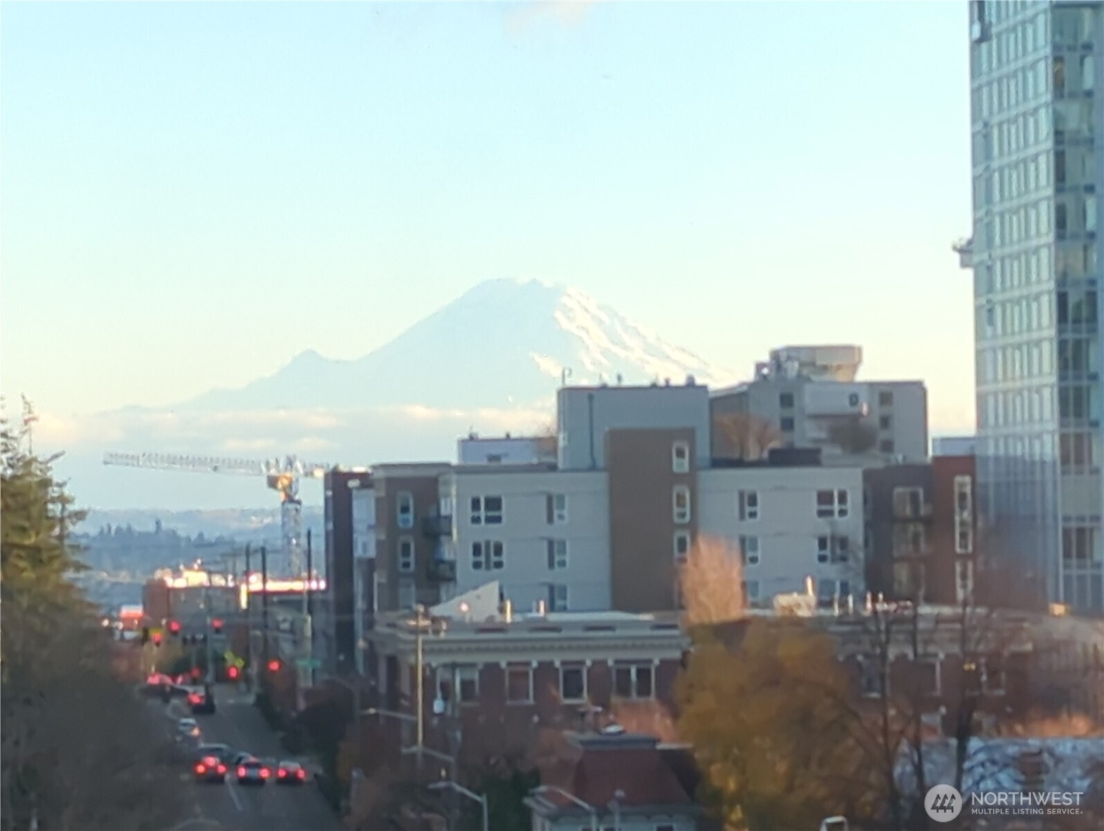 1105 Spring Street, Unit 709 Seattle, WA 98104 - Photo 26 of 30 a view of a city with tall buildings