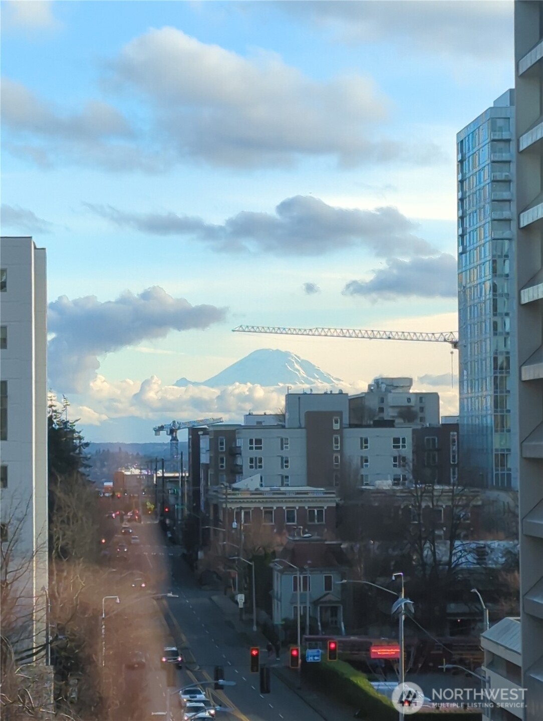 1105 Spring Street, Unit 709 Seattle, WA 98104 - Photo 28 of 30 a view of a city with tall buildings