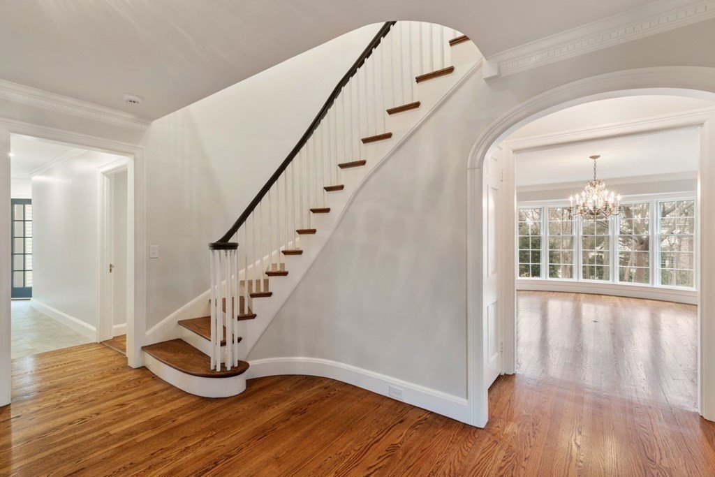 32 Peirce Road Wellesley, MA 02481 - Photo 7 of 40 a view of entryway and hall with wooden floor