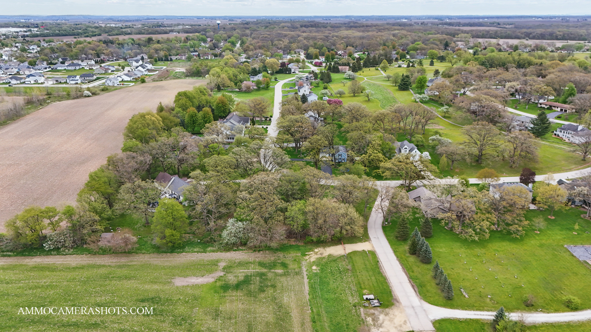 Lot 3 Ellwood Greens Road Genoa, IL 60135 - Photo 14 of 20 an aerial view of residential houses with outdoor space and trees