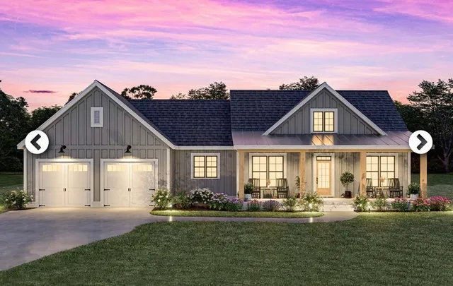 a front view of a house with a yard and porch
