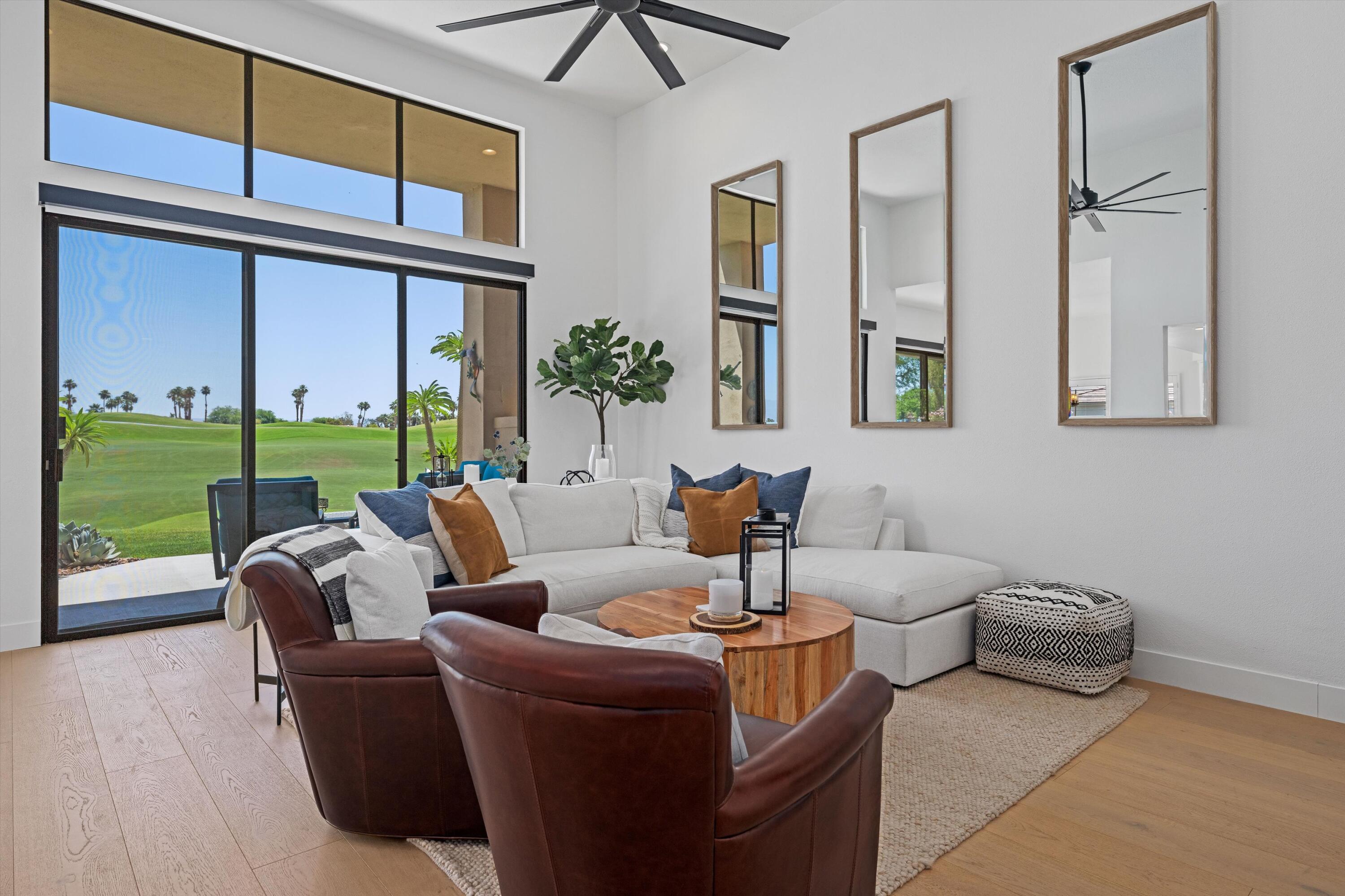 54754 Oak-Tree La Quinta, CA 92253 - Photo 14 of 33 a living room with furniture and a large window