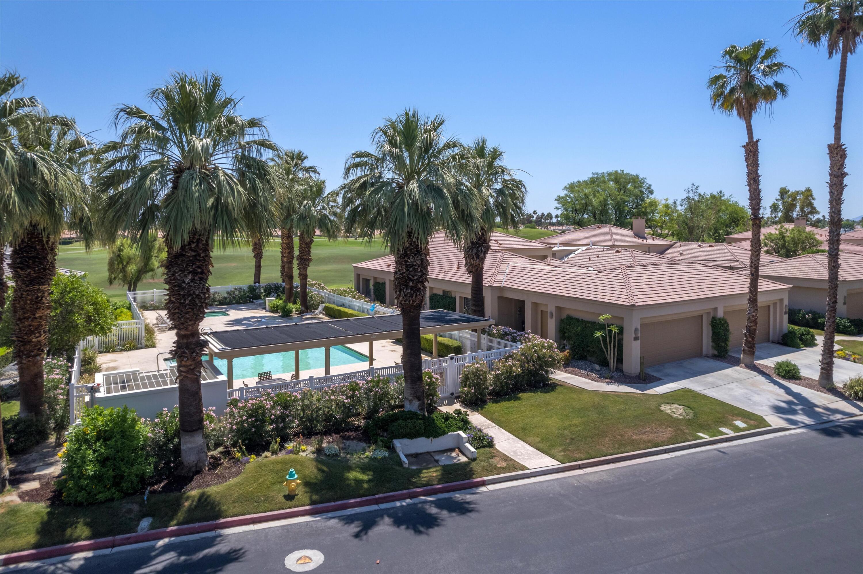 54754 Oak-Tree La Quinta, CA 92253 - Photo 2 of 33 a view of a house with pool and sitting area