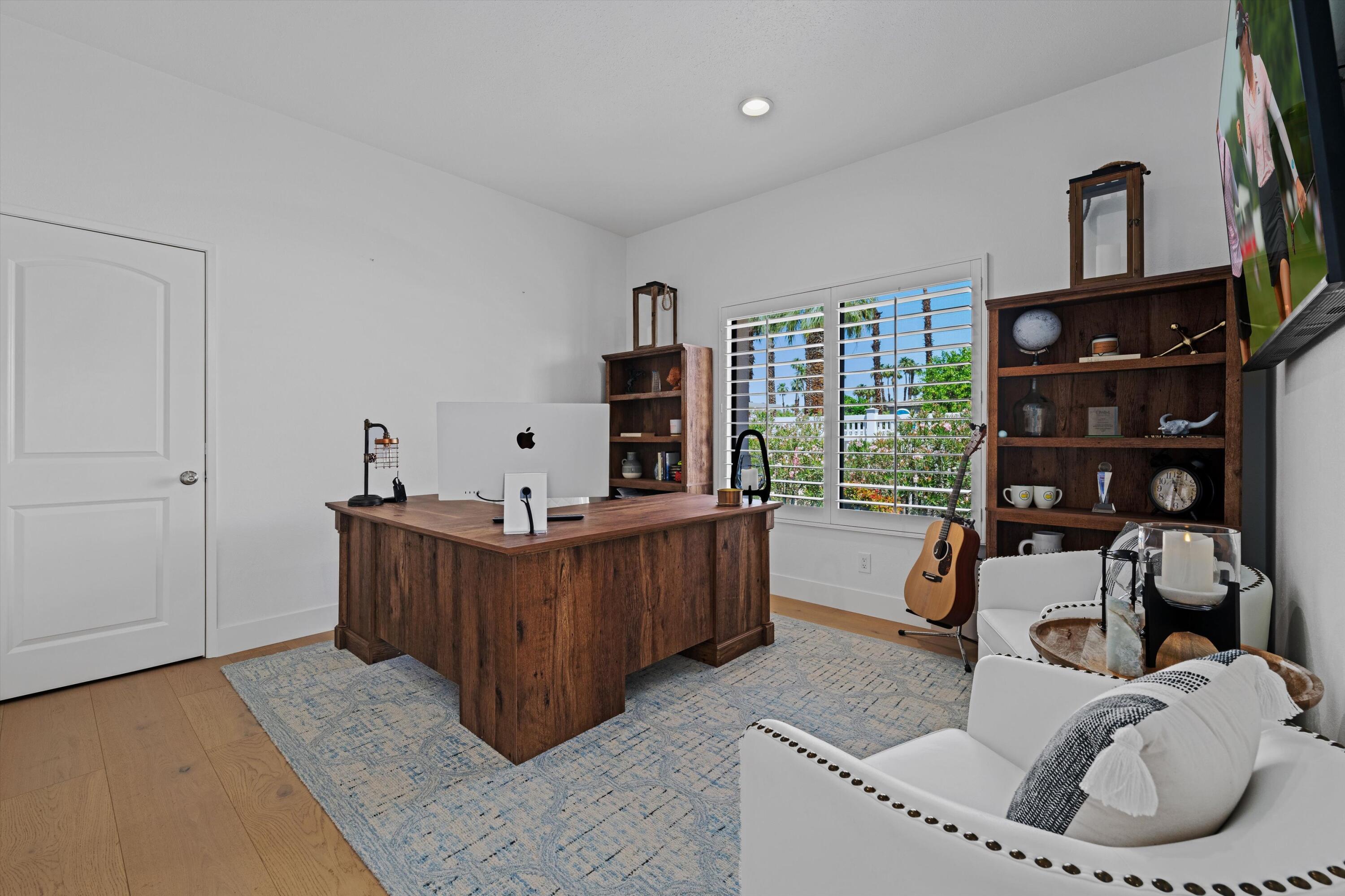 54754 Oak-Tree La Quinta, CA 92253 - Photo 23 of 33 a living room with furniture and a window