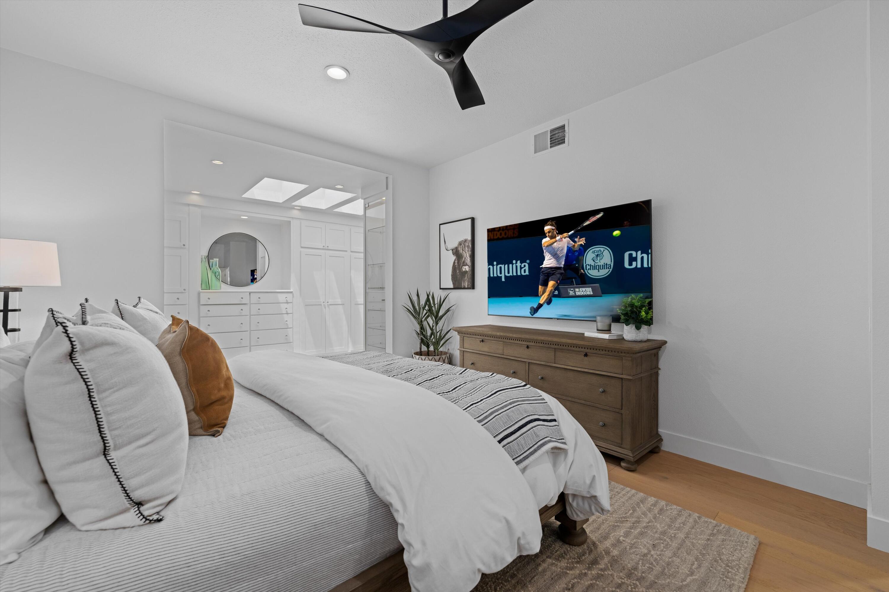 54754 Oak-Tree La Quinta, CA 92253 - Photo 26 of 33 a bedroom with a bed and a flat screen tv