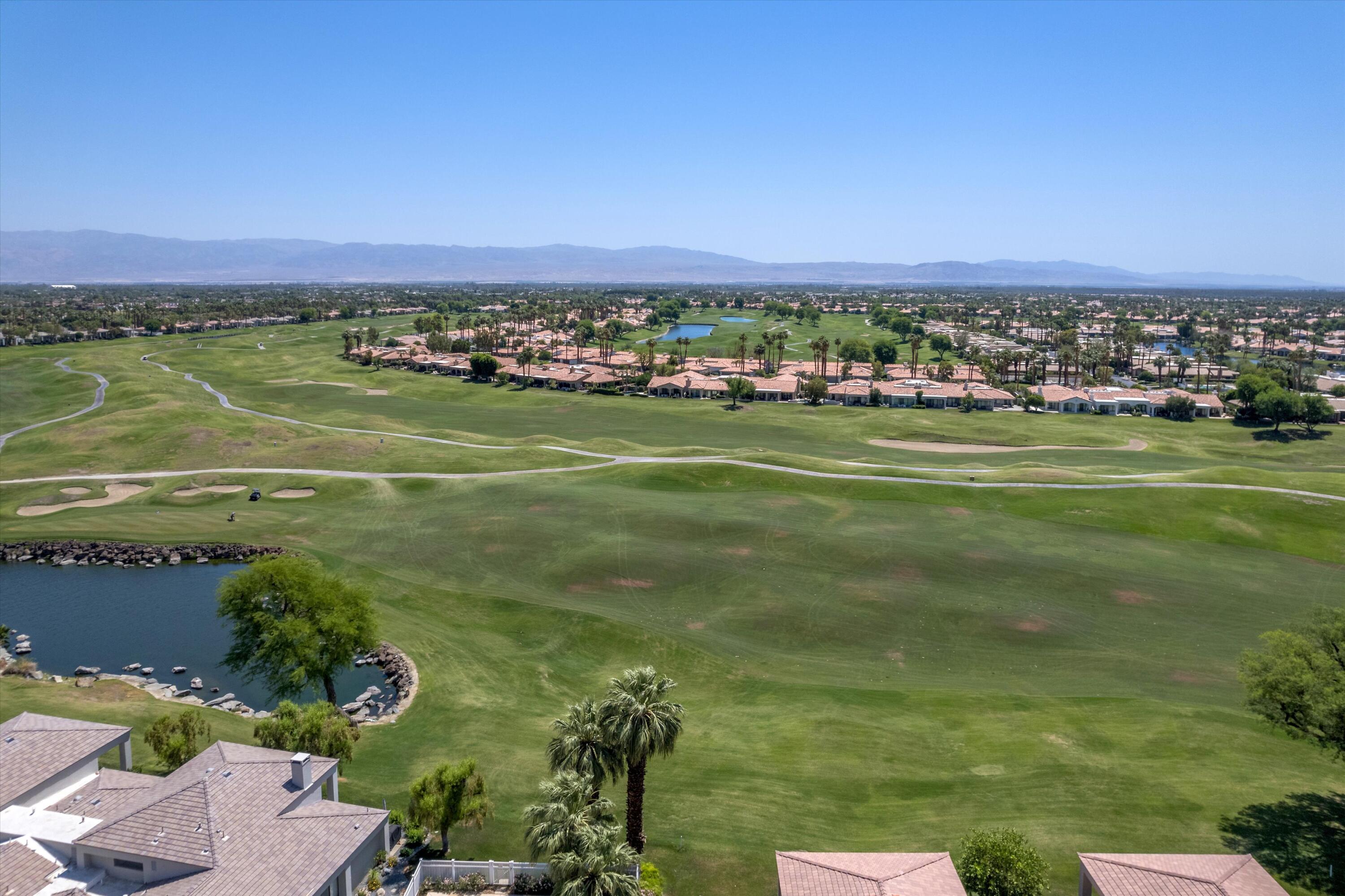 54754 Oak-Tree La Quinta, CA 92253 - Photo 3 of 33 a view of a city with lots of houses
