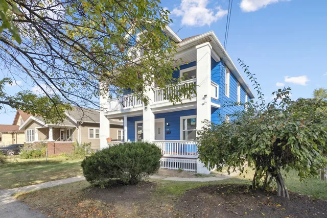 a view of a porch with wooden floor and outdoor space