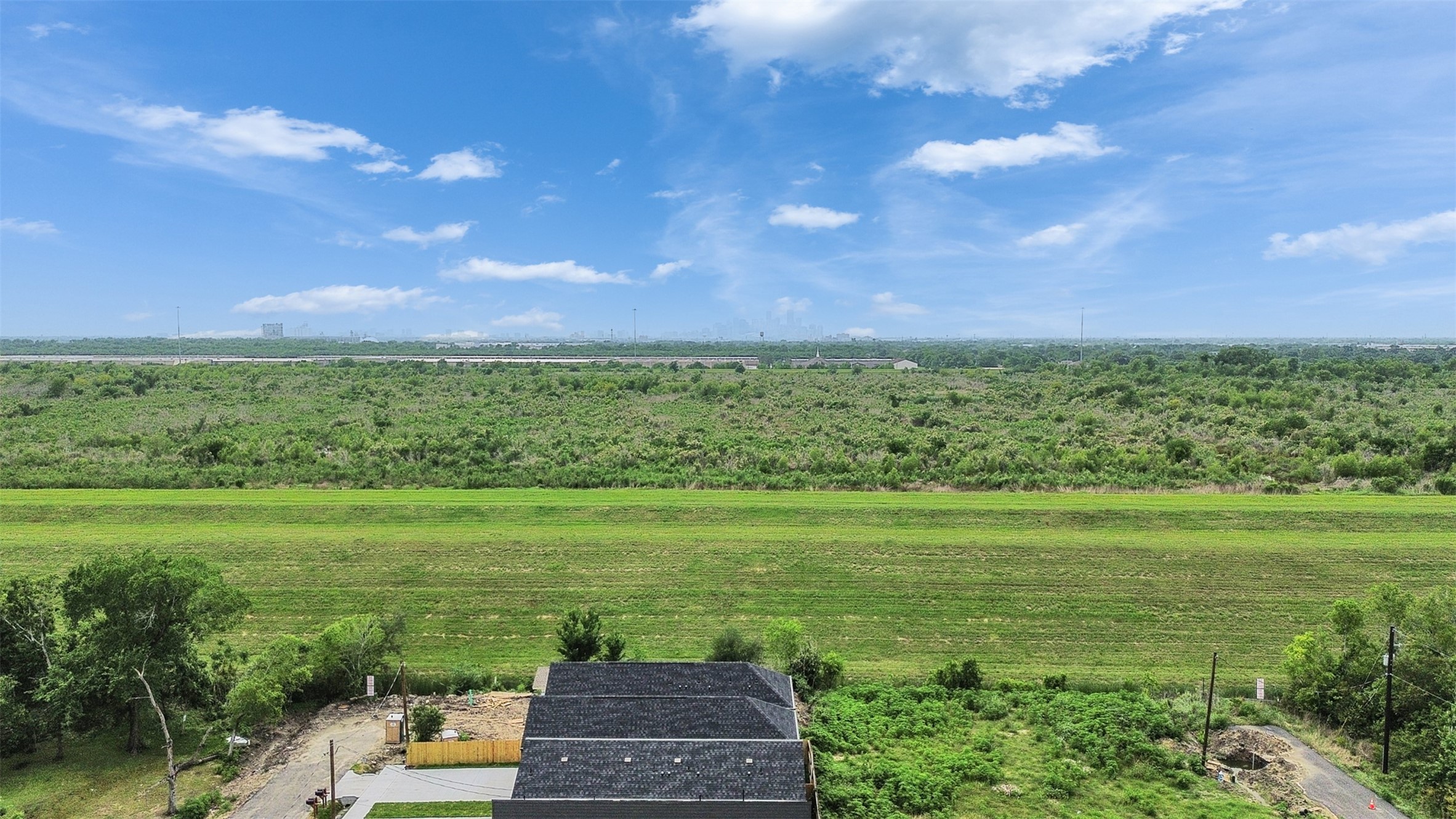 9709 Cargill Street, Unit AB Houston, TX 77029 - Photo 7 of 32 a view of a city with an ocean