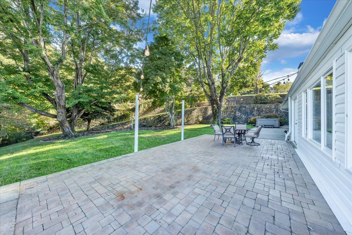 5588 Highfields Road Roanoke, VA 24018 - Photo 51 of 86 a view of a house with backyard porch and sitting area