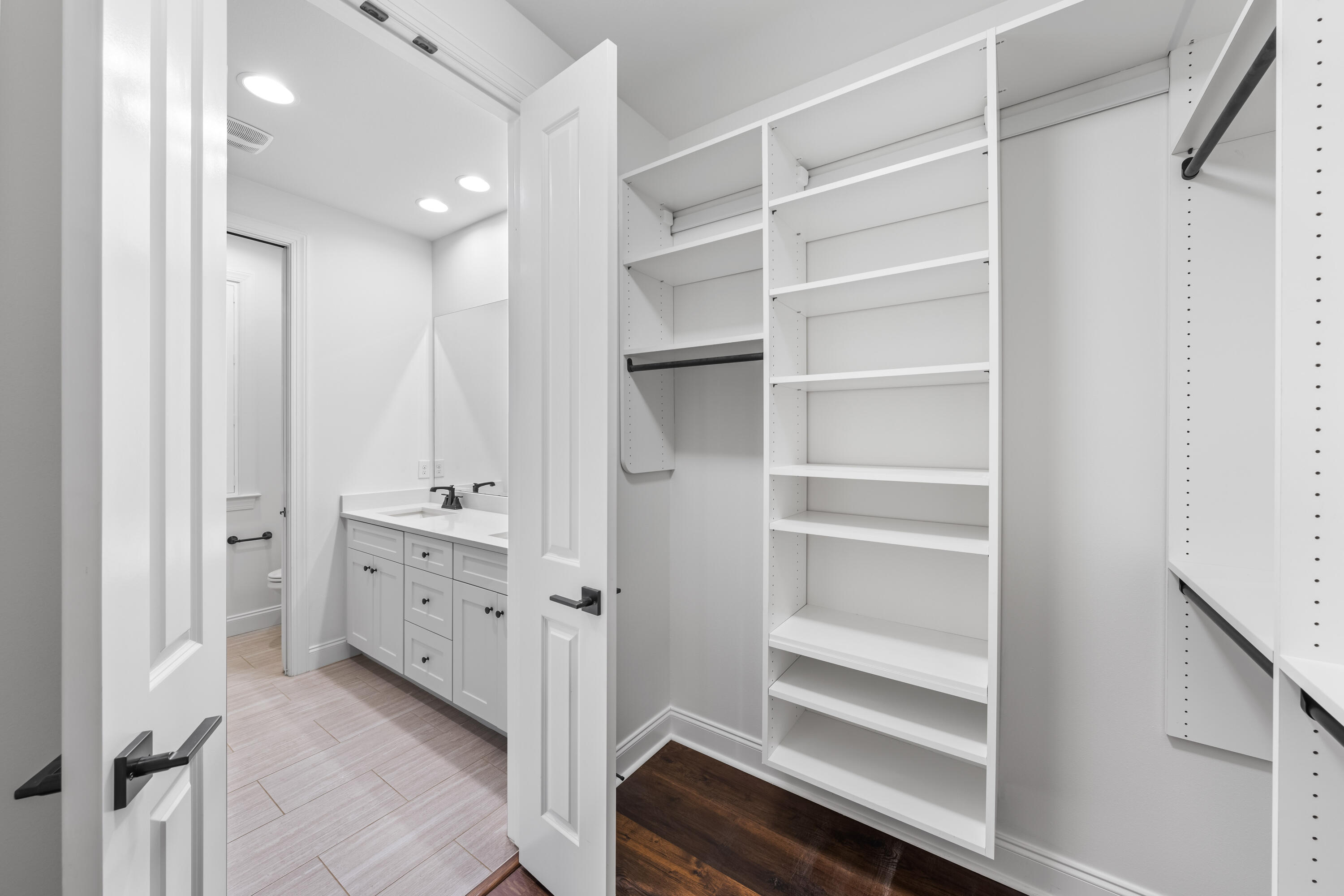 253 Windrow Way Watersound, FL 32461 - Photo 29 of 46 a view of walk in closet with empty racks