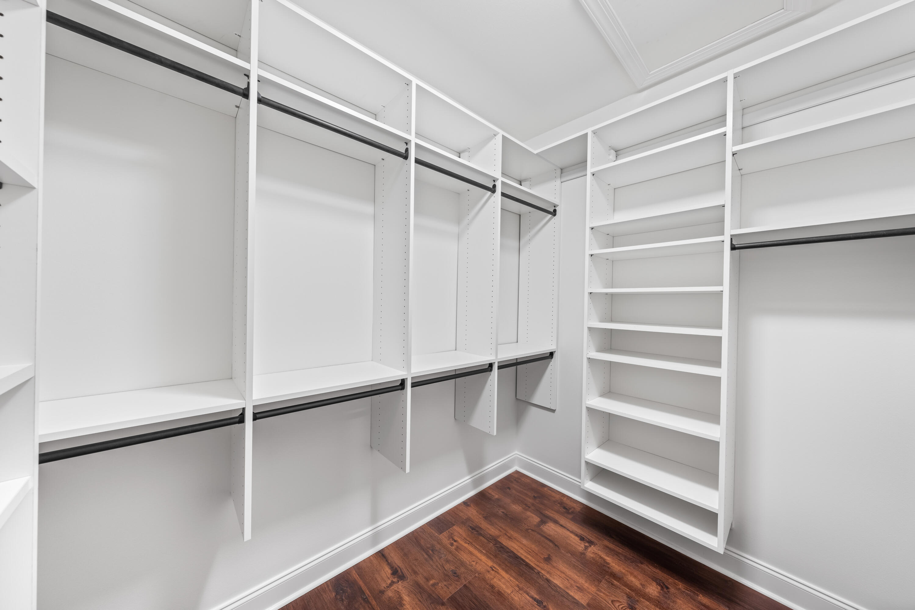 253 Windrow Way Watersound, FL 32461 - Photo 30 of 46 a view of walk in closet with empty racks