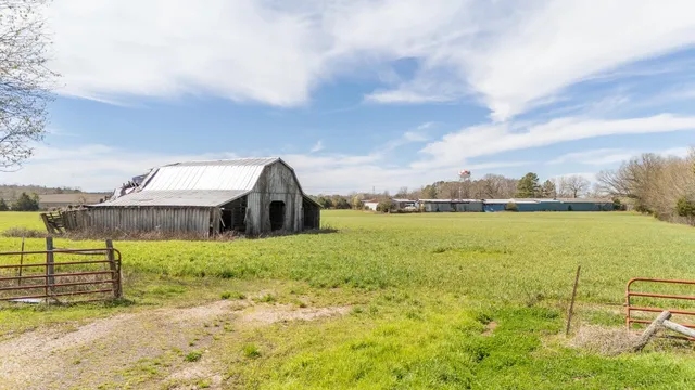 a view of a lake with a yard