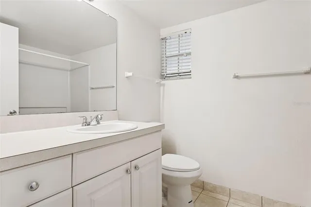 a bathroom with a bath tub with a shower