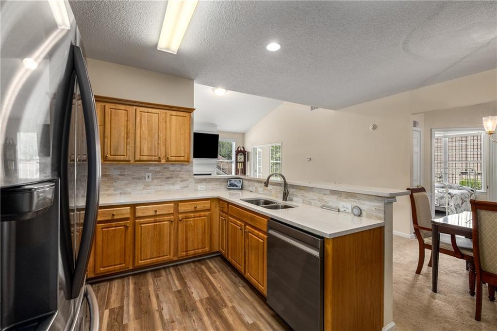 855 Camry Circle Dallas, GA 30157 - Photo 14 of 41 a kitchen with a sink appliances and cabinets
