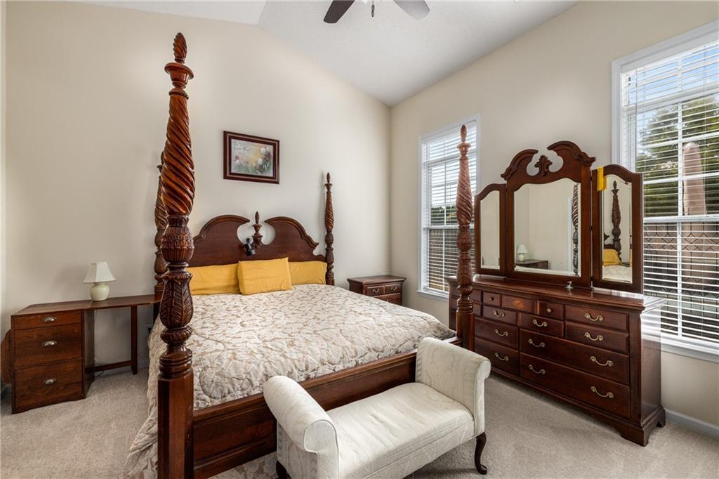 855 Camry Circle Dallas, GA 30157 - Photo 16 of 41 a bedroom with a bed and a dresser