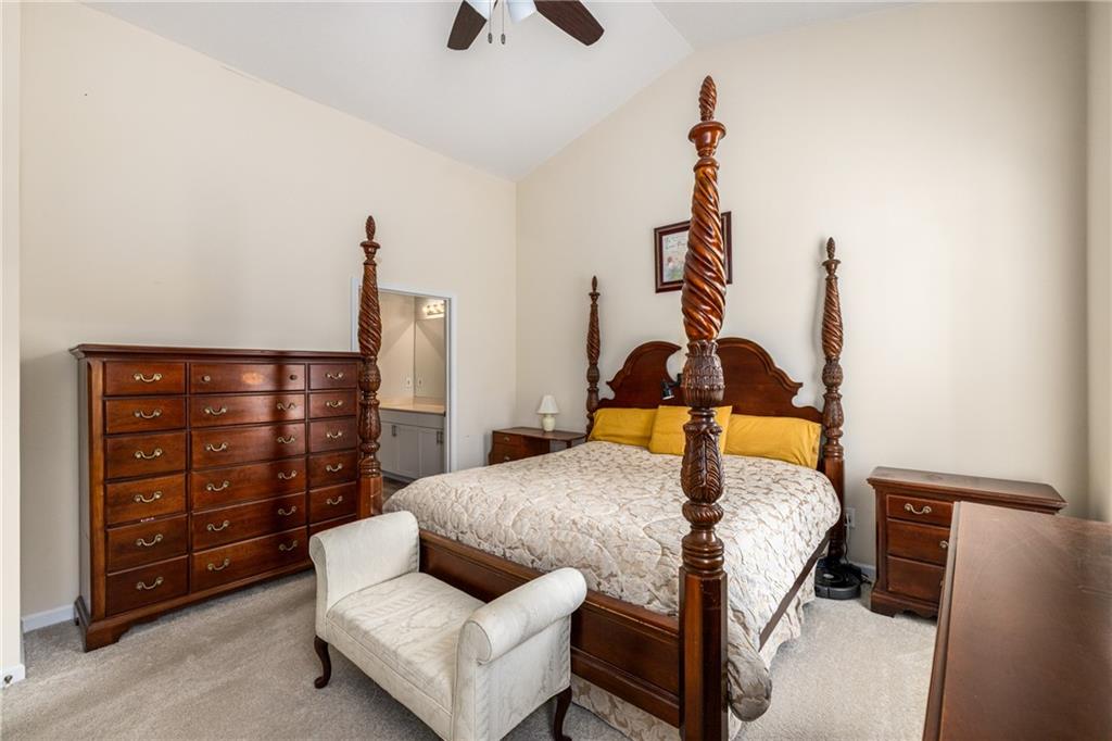 855 Camry Circle Dallas, GA 30157 - Photo 17 of 41 a bed room with a bed and a dresser