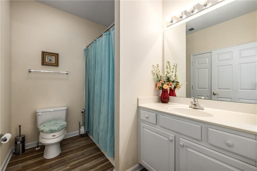 855 Camry Circle Dallas, GA 30157 - Photo 23 of 41 a bathroom with a sink toilet and shower