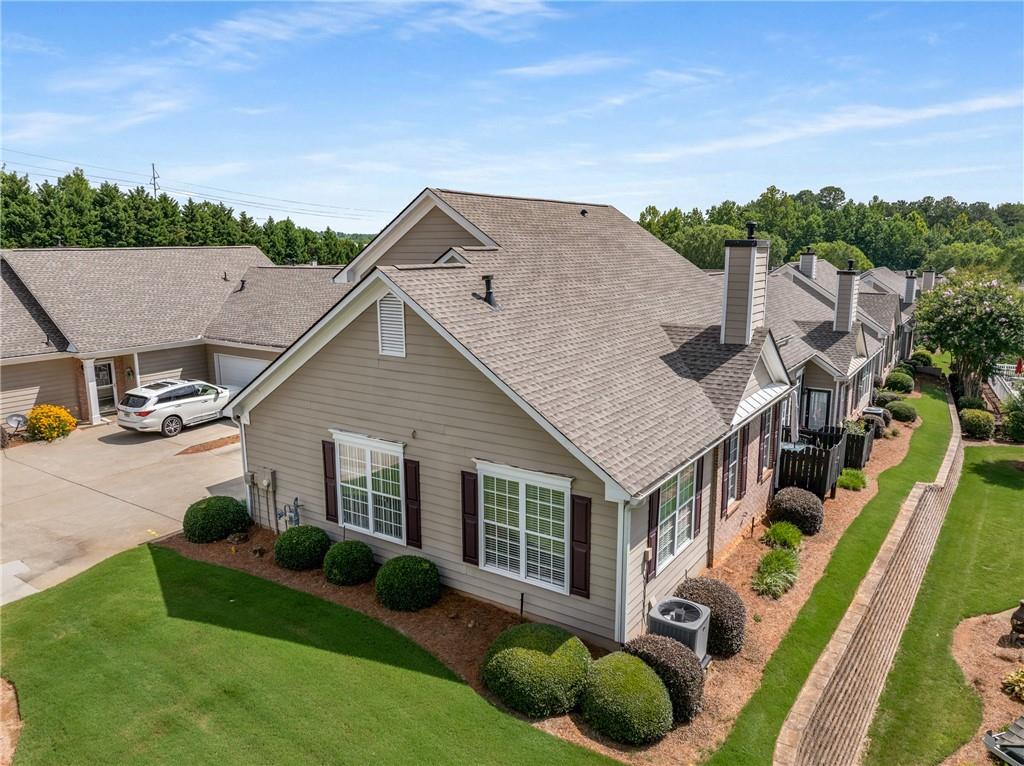 855 Camry Circle Dallas, GA 30157 - Photo 31 of 41 a aerial view of a house with porch yard and trampoline