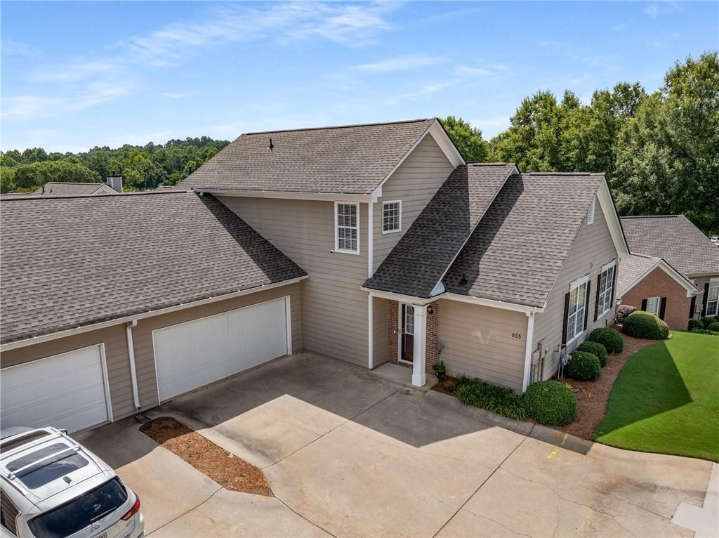855 Camry Circle Dallas, GA 30157 - Photo 32 of 41 a aerial view of a house next to a yard