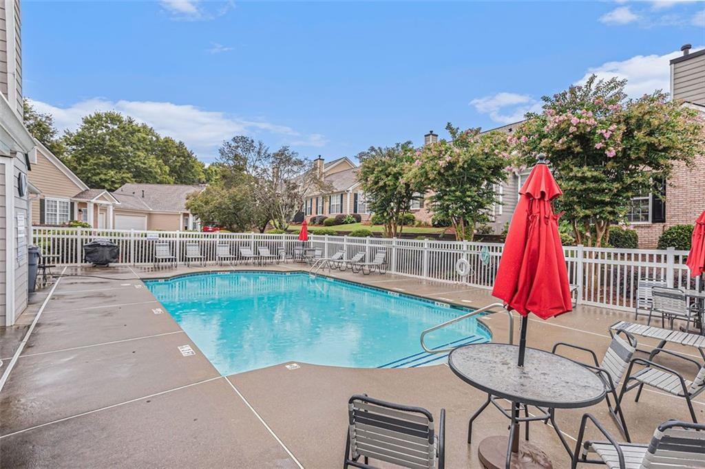 855 Camry Circle Dallas, GA 30157 - Photo 37 of 41 a view of a swimming pool with a patio