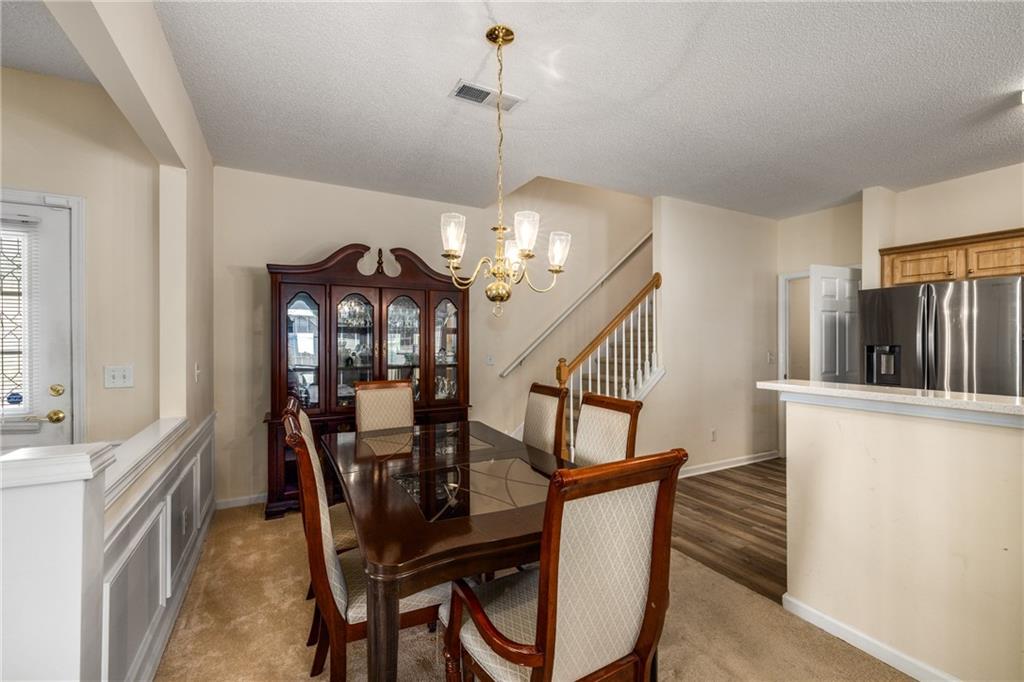 855 Camry Circle Dallas, GA 30157 - Photo 4 of 41 a view of a hallway with seating area