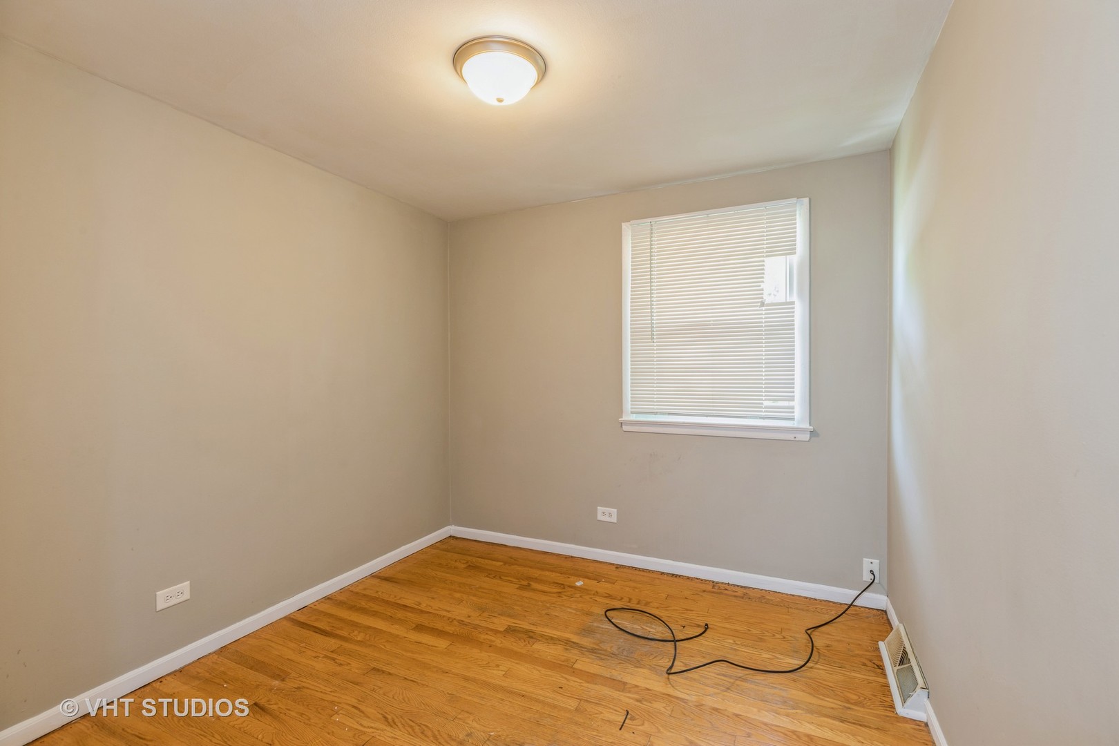 3941 169th Street Country Club Hills, IL 60478 - Photo 17 of 22 an empty room with a window