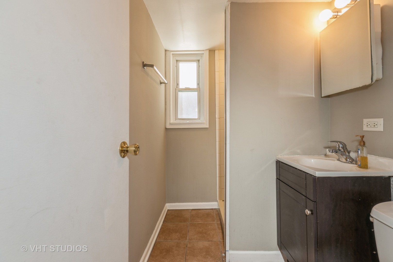 3941 169th Street Country Club Hills, IL 60478 - Photo 20 of 22 a bathroom with a sink and a mirror