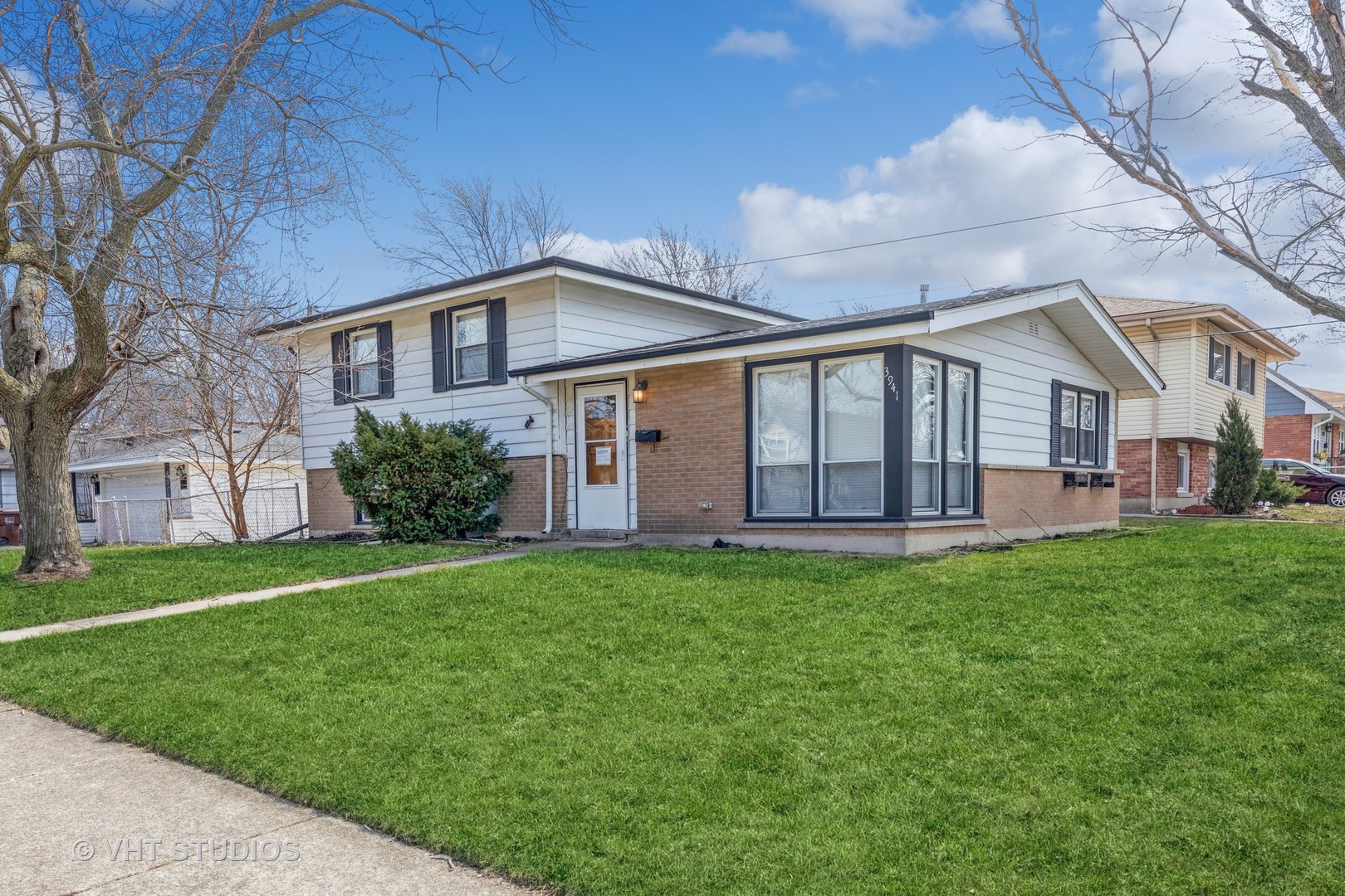 3941 169th Street Country Club Hills, IL 60478 - Photo 3 of 22 a view of a yard in front of a house