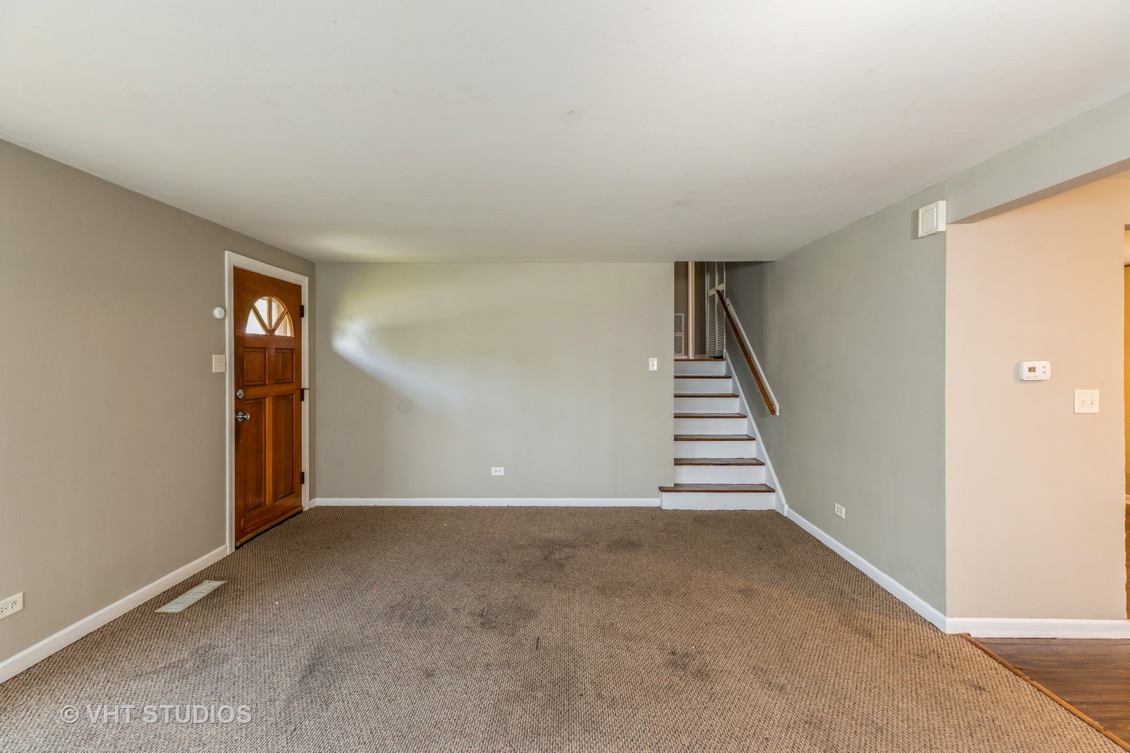 3941 169th Street Country Club Hills, IL 60478 - Photo 5 of 22 a view of an empty room with stairs