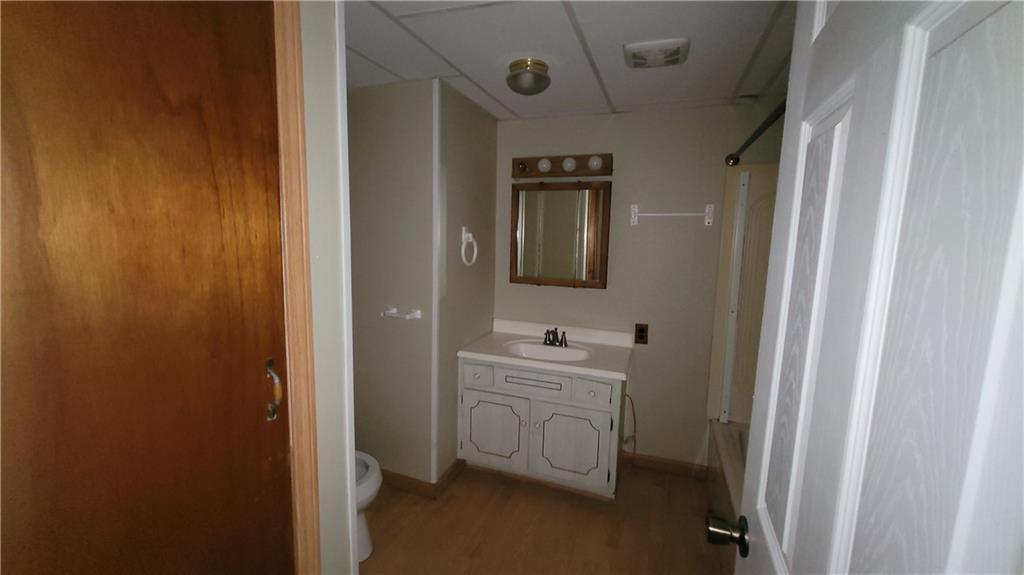 225 Lowber Road Fayette City, PA 15438 - Photo 15 of 29 a bathroom with a sink a toilet and mirror