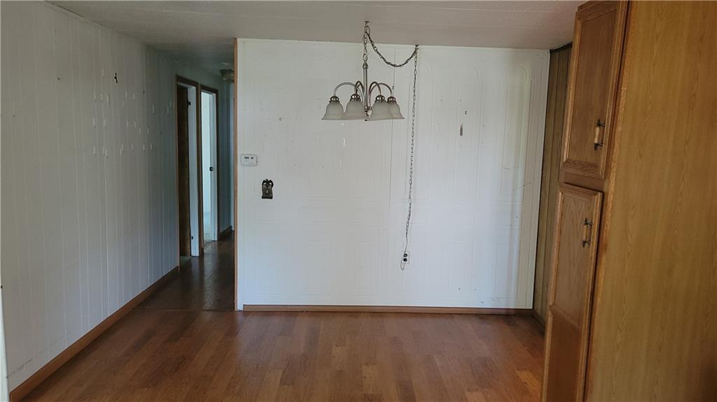 225 Lowber Road Fayette City, PA 15438 - Photo 8 of 29 a view of a hallway with wooden floor