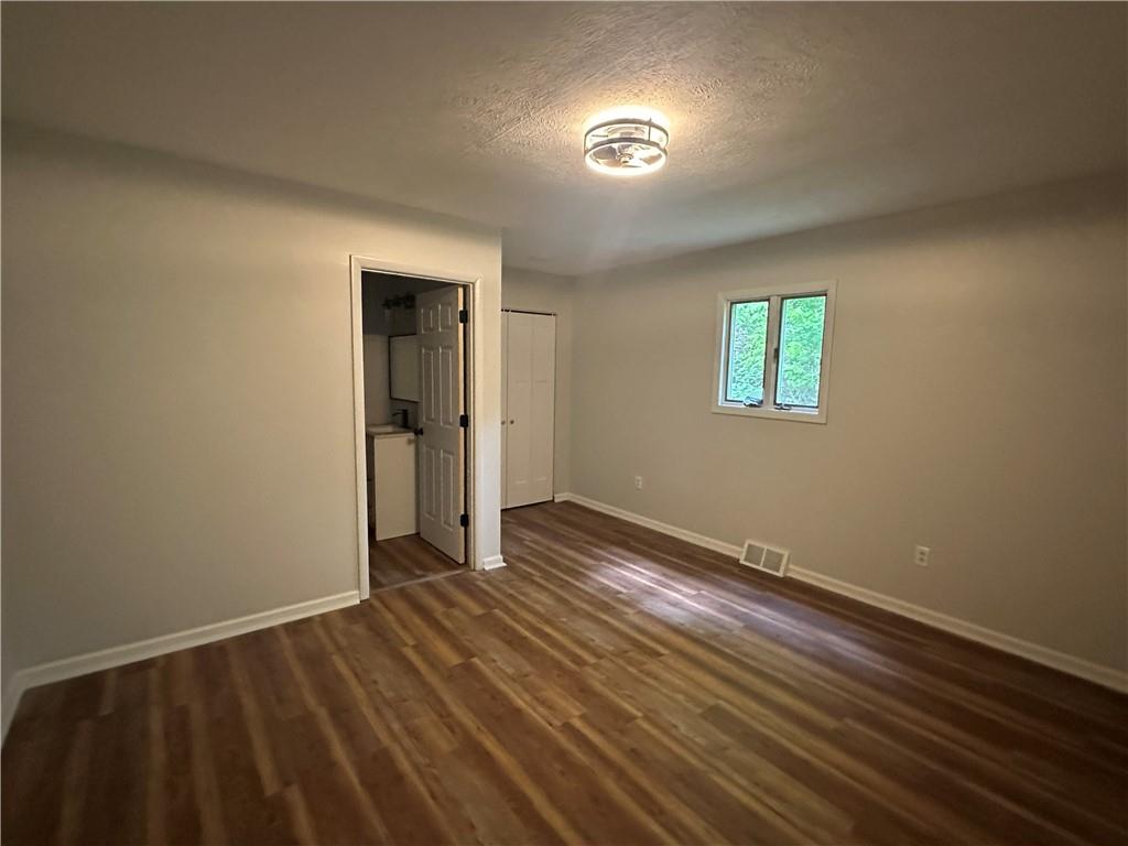 201 Clever Road McKees Rocks, PA 15136 - Photo 12 of 30 wooden floor in an empty room with a window
