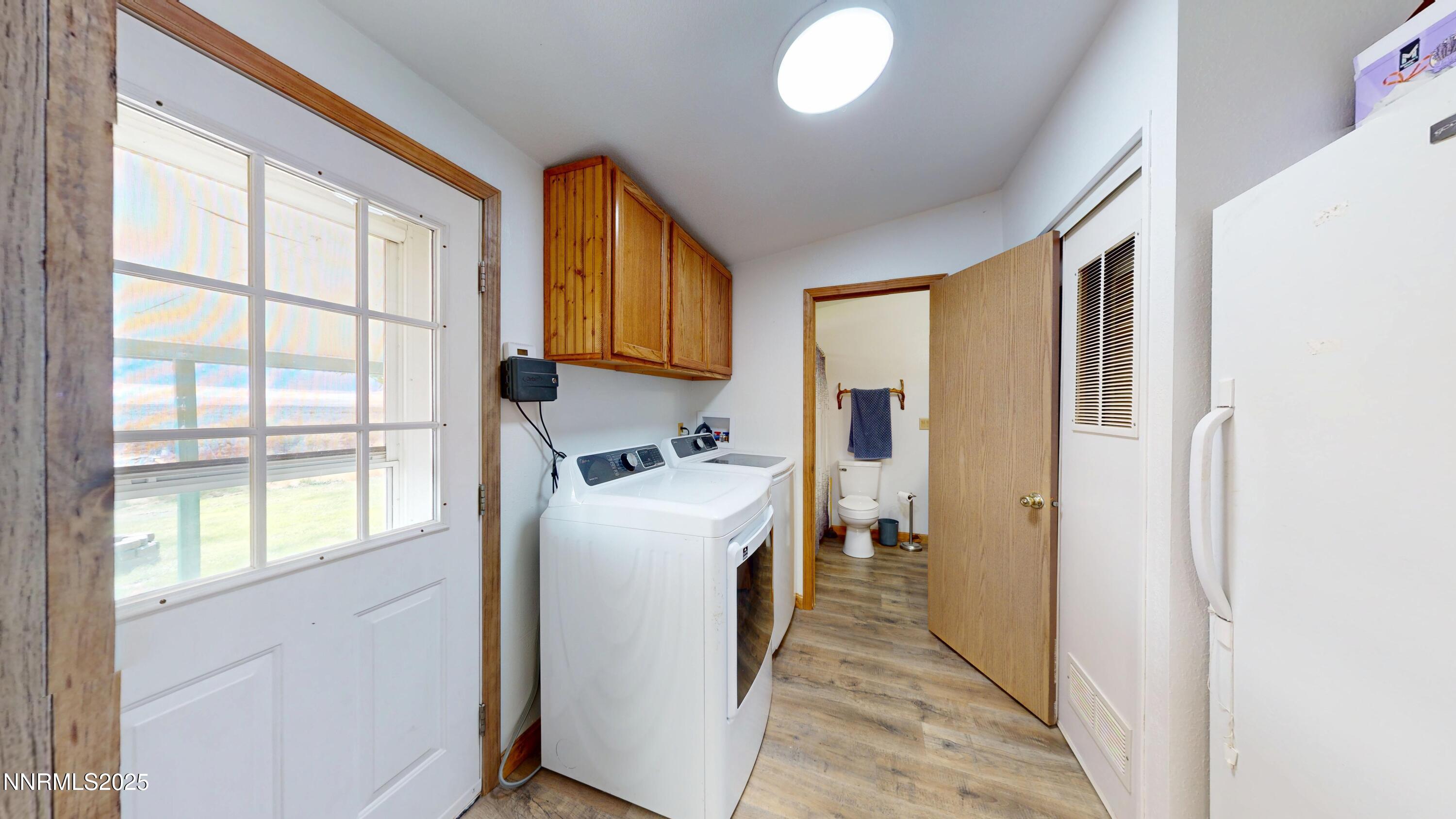 8425 Styles Court Winnemucca, NV 89445 - Photo 12 of 27 a view of a storage and utility room with washer and dryer