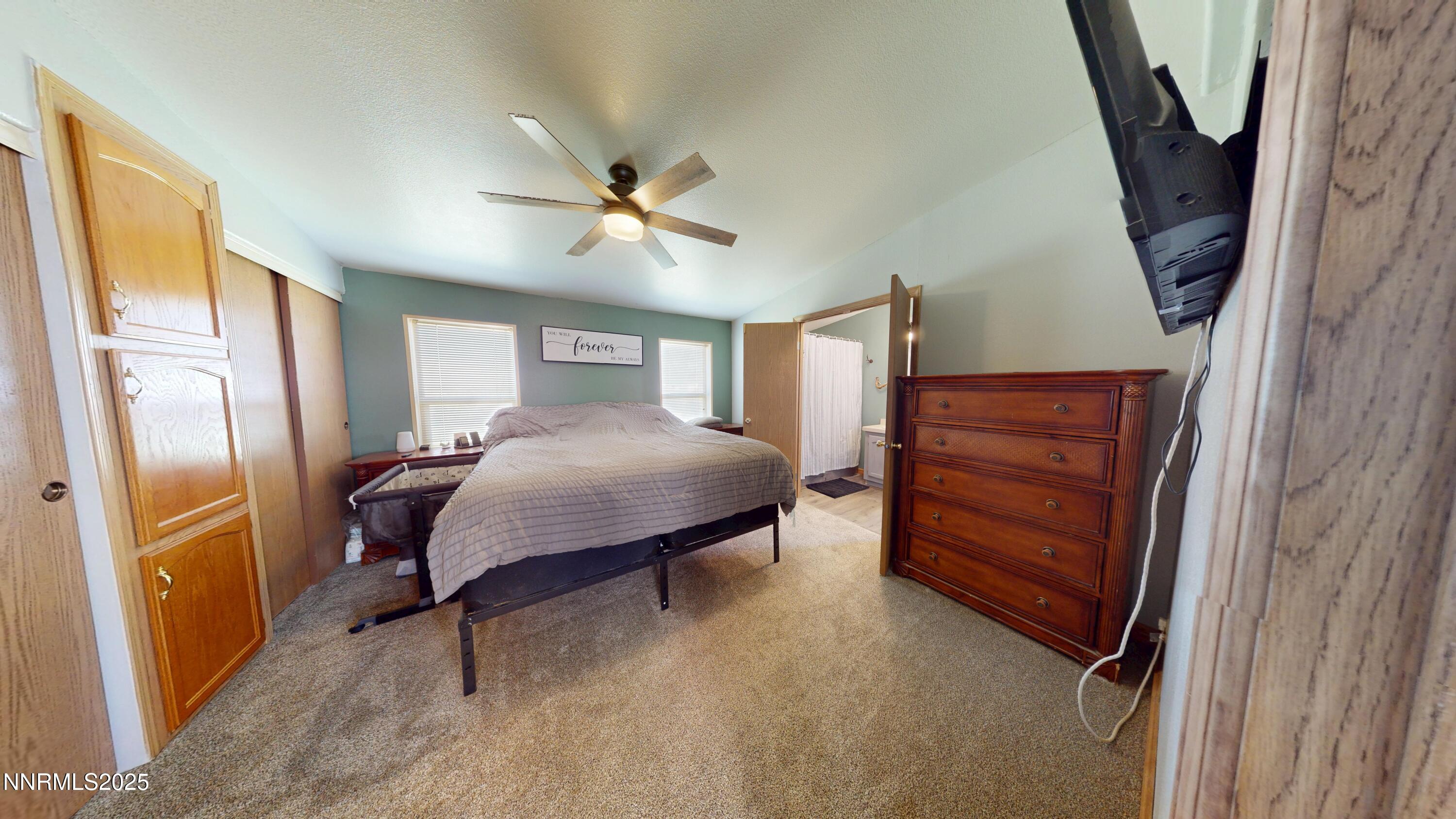 8425 Styles Court Winnemucca, NV 89445 - Photo 15 of 27 a bedroom with furniture and a window