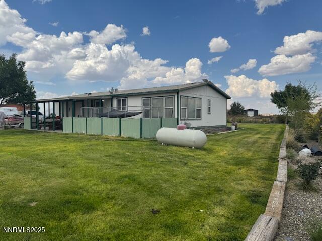8425 Styles Court Winnemucca, NV 89445 - Photo 19 of 27 a view of a house with a backyard
