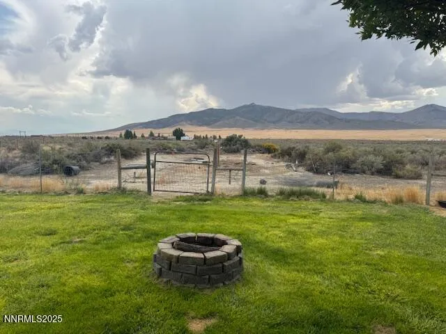 a view of a house with swimming pool and porch