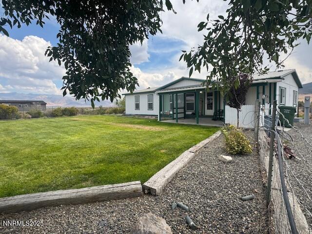 8425 Styles Court Winnemucca, NV 89445 - Photo 24 of 27 a view of a house with a yard
