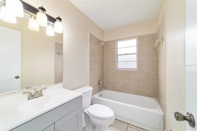 a bathroom with a sink a toilet and a bathtub