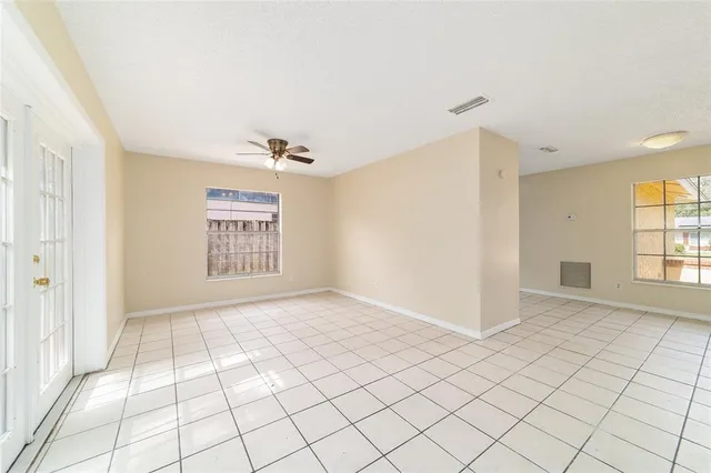 a view of an empty room and window