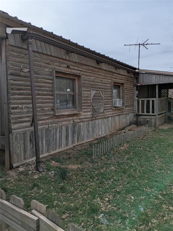 402 Marion Street Merkel, TX 79536 - Photo 5 of 23 a backyard of a house with lots of green space