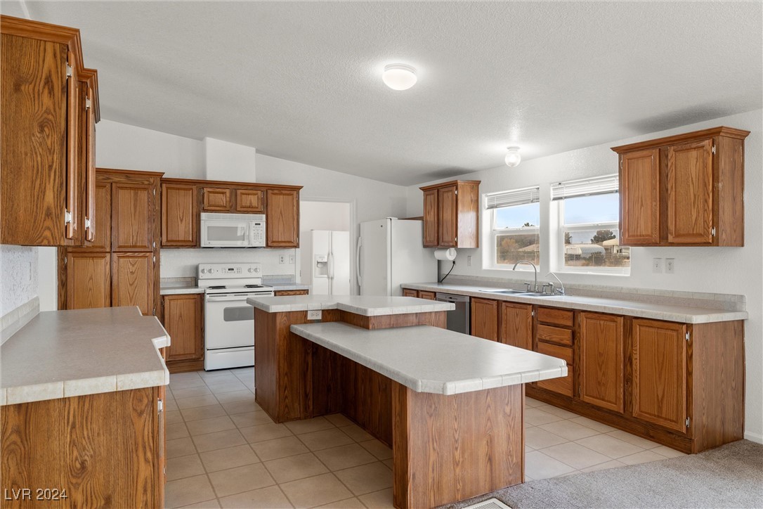 3130 McGraw Road Pahrump, NV 89061 - Photo 14 of 42 KITCHEN WITH ISLAND, GENEROUS COUNTER SPACE