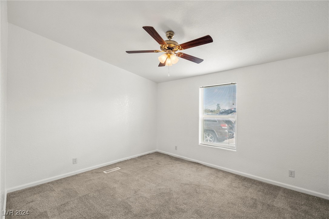 3130 McGraw Road Pahrump, NV 89061 - Photo 34 of 42 4TH BEDROOM W/ WALK-IN CLOSET, CEILING FAN