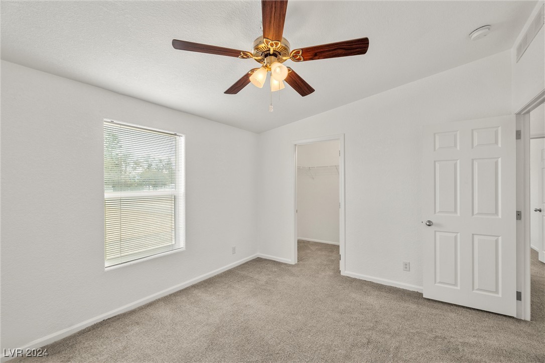 3130 McGraw Road Pahrump, NV 89061 - Photo 35 of 42 4TH BEDROOM W/ WALK-IN CLOSET, CEILING FAN