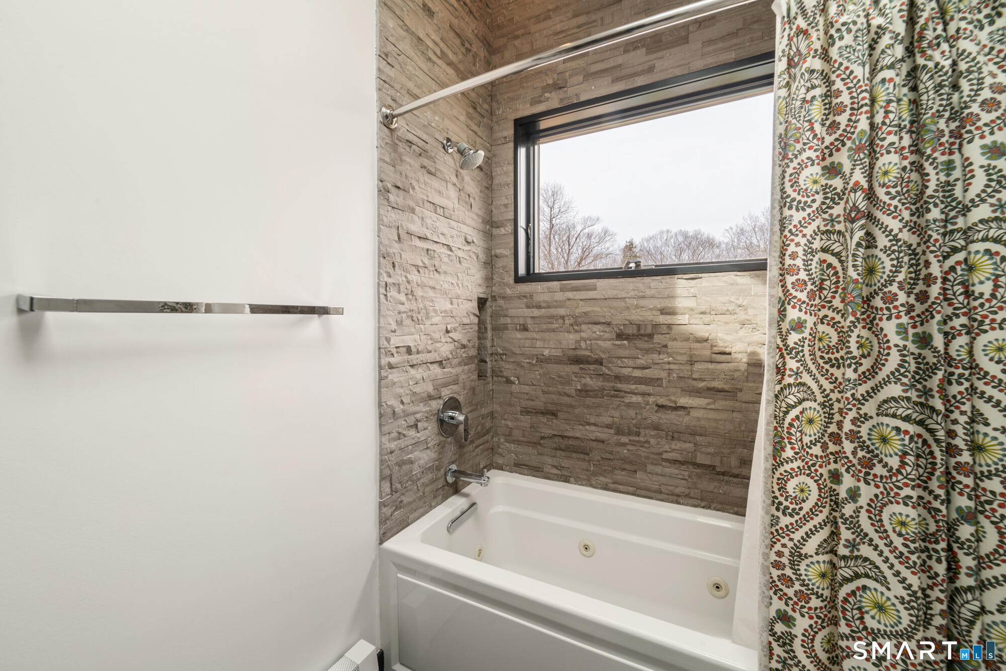 14 Fox Ridge Guilford, CT 06437 - Photo 24 of 39 a bathroom with a bathtub and shower