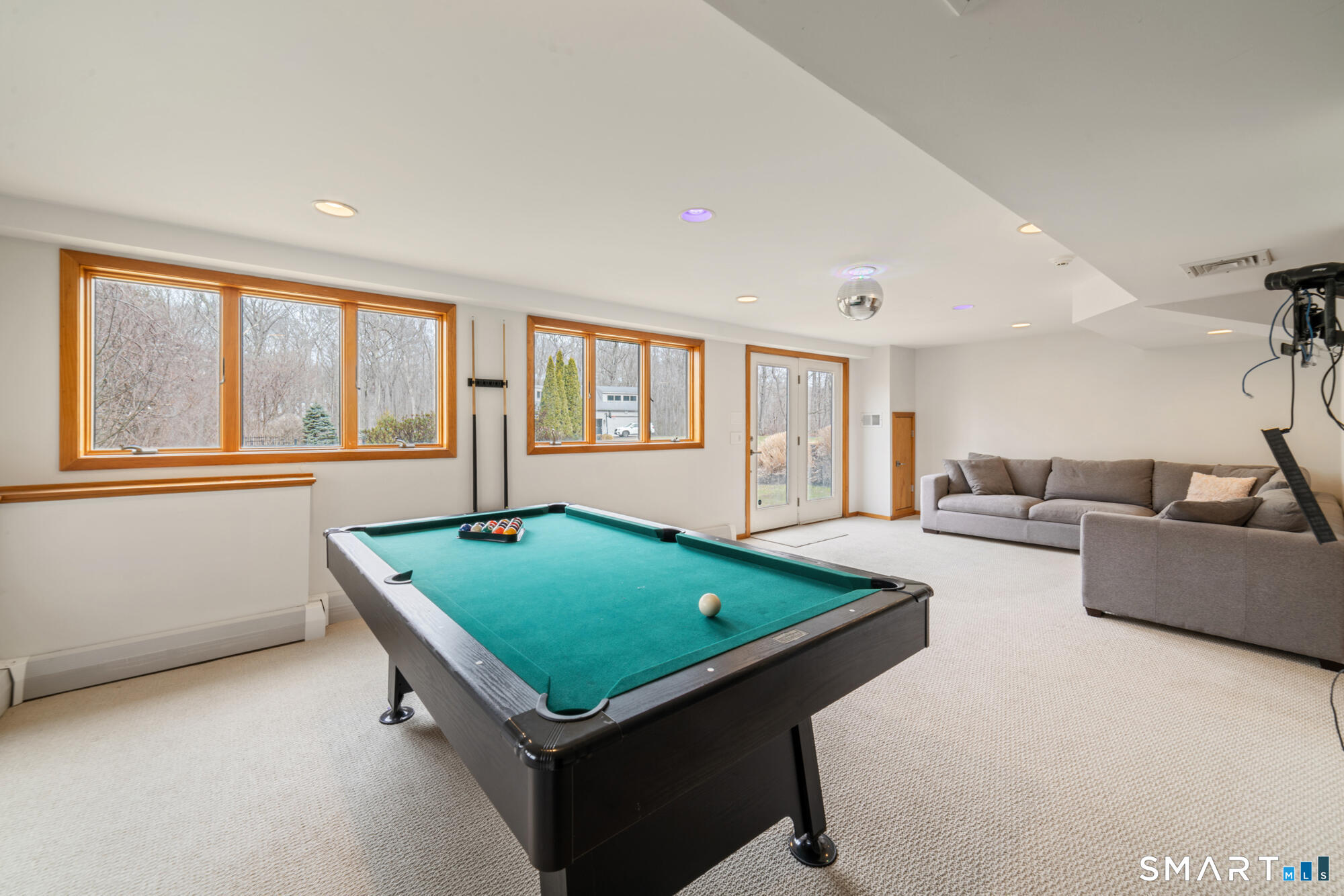 14 Fox Ridge Guilford, CT 06437 - Photo 29 of 39 a living room with furniture and a large window