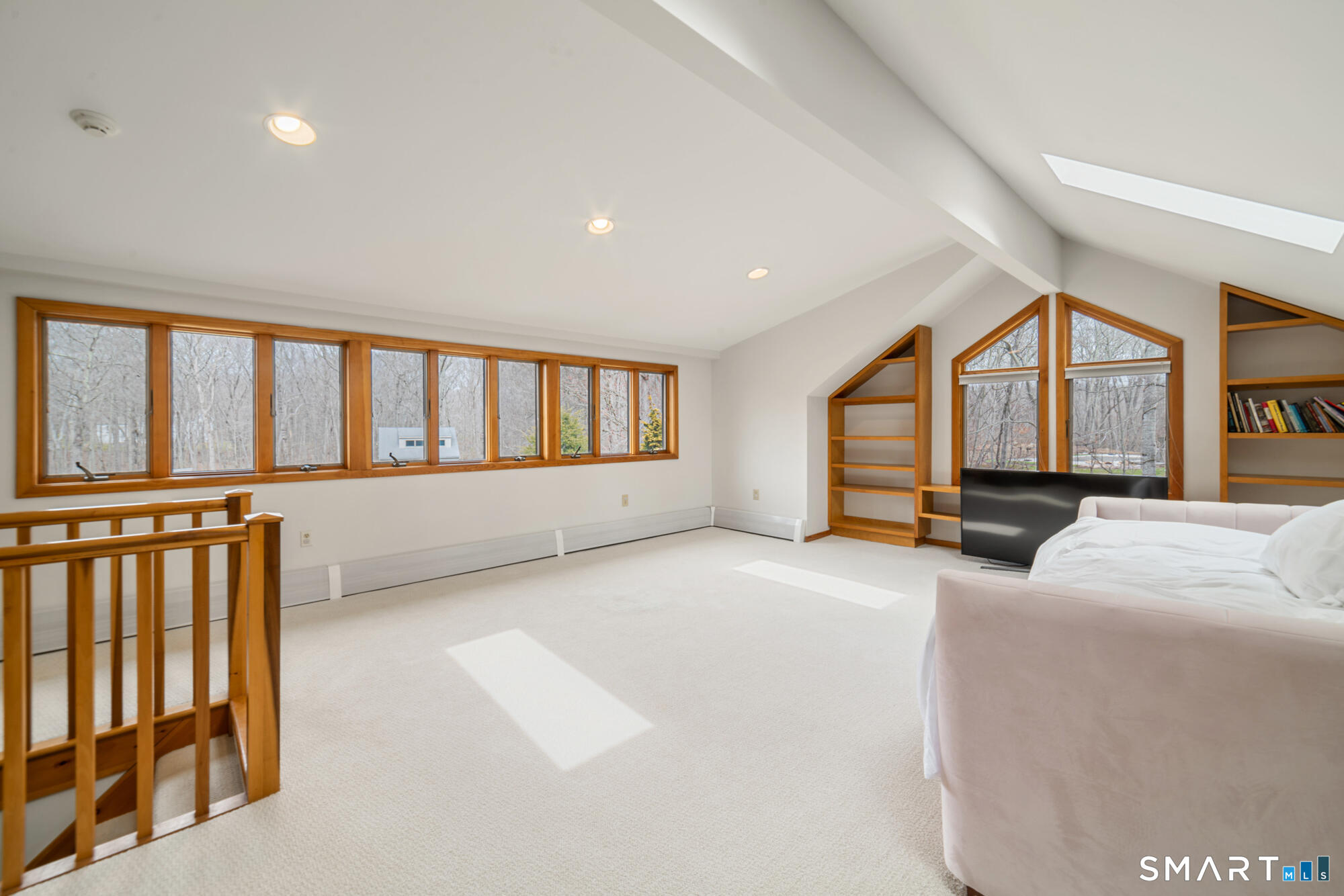 14 Fox Ridge Guilford, CT 06437 - Photo 30 of 39 a living room with a large windows
