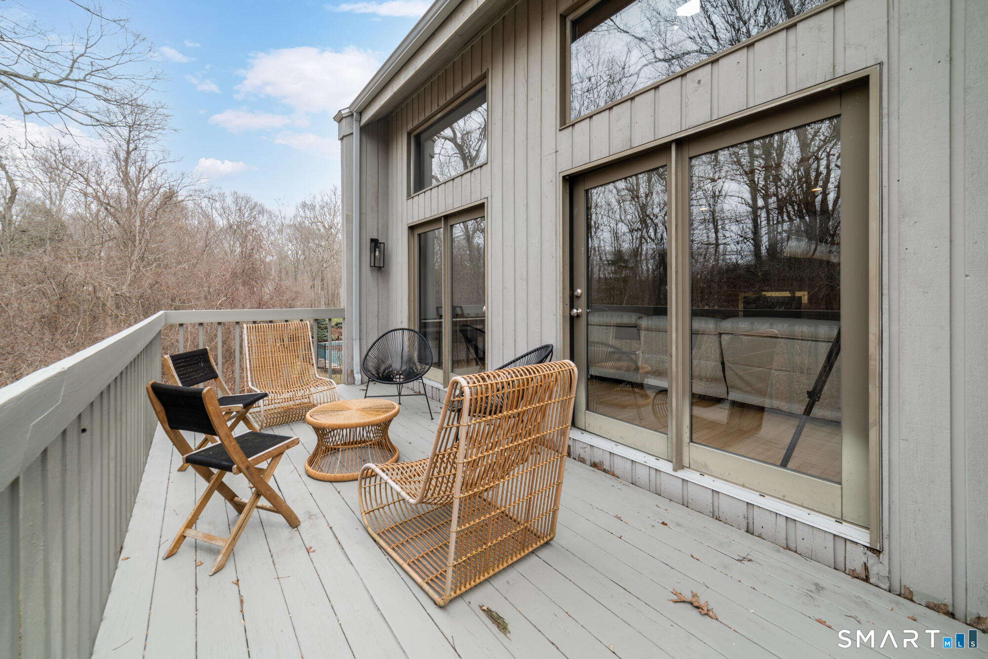 14 Fox Ridge Guilford, CT 06437 - Photo 35 of 39 a patio with glass top table and chairs