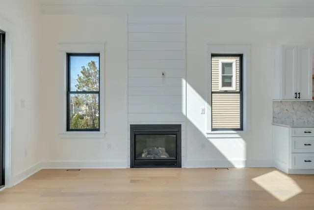 a kitchen with a stove a refrigerator and a sink