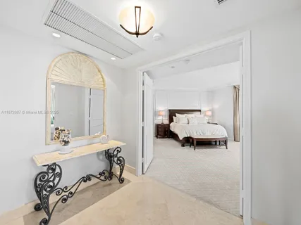 a spacious bathroom with a double vanity sink and a mirror