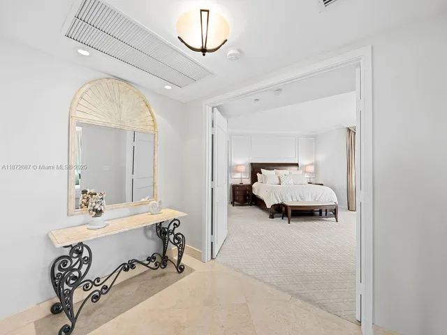 a spacious bathroom with a double vanity sink and a mirror